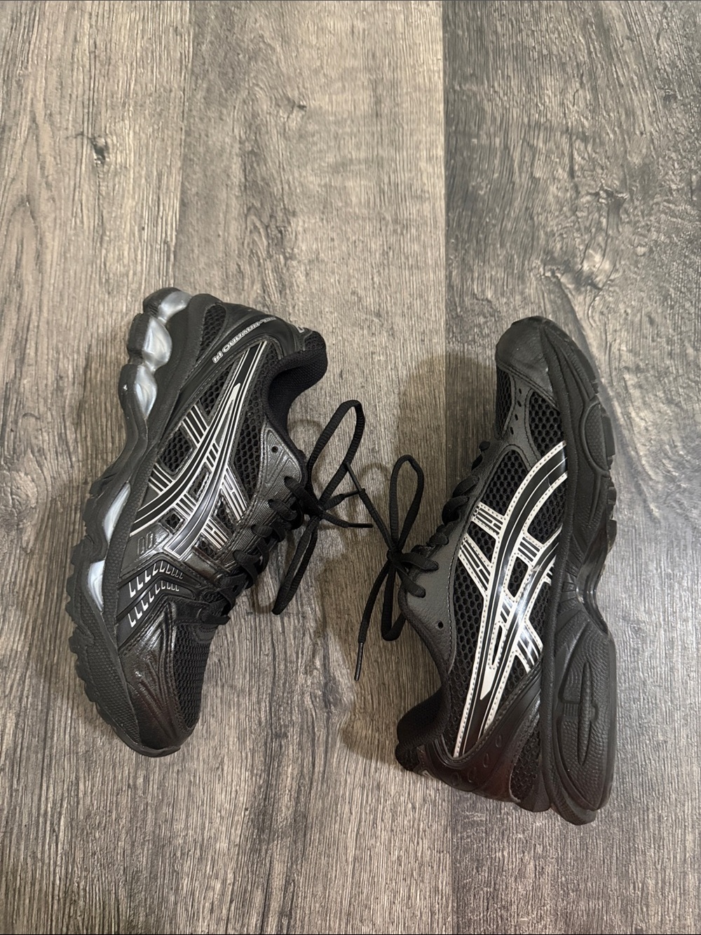 Asics Black Athletic Running Shoes with Silver Stripes